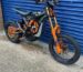 orange and blue 2023 surron light bee
