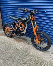 orange and blue 2023 surron light bee